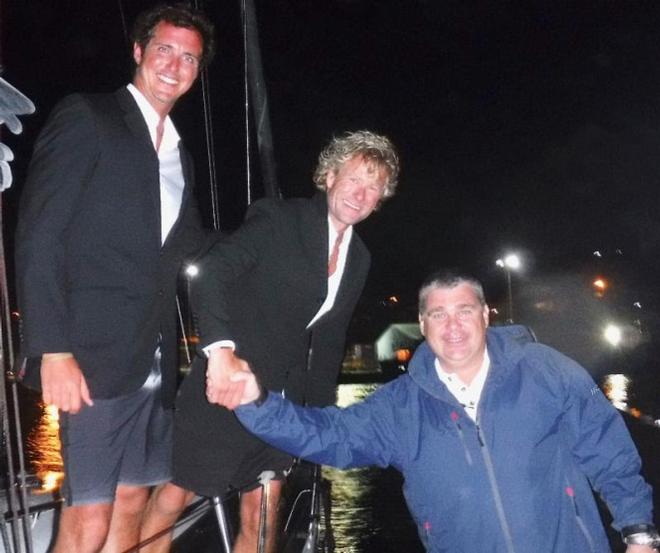 Finishing in style wearing DJs: James Heald and Ben Harris completed the 3,000 nmile race from Lanzarote to Grenada in the early hours of Thursday 15 December and were greeted on the dock at Camper and Nicholsons Port Louis Marina by Marina Manager, Glynn Thomas and Louay Habib, RORC Media Reporter - RORC Transatlantic Race © Louay Habib / RORC